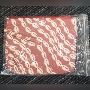 Fighting Eel tyvek wristlet pouch in Light Spice Cowrie